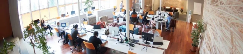 people working in an open plan office