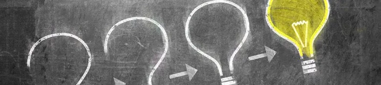 Chalk drawing of lightbulbs representing inductive reasoning