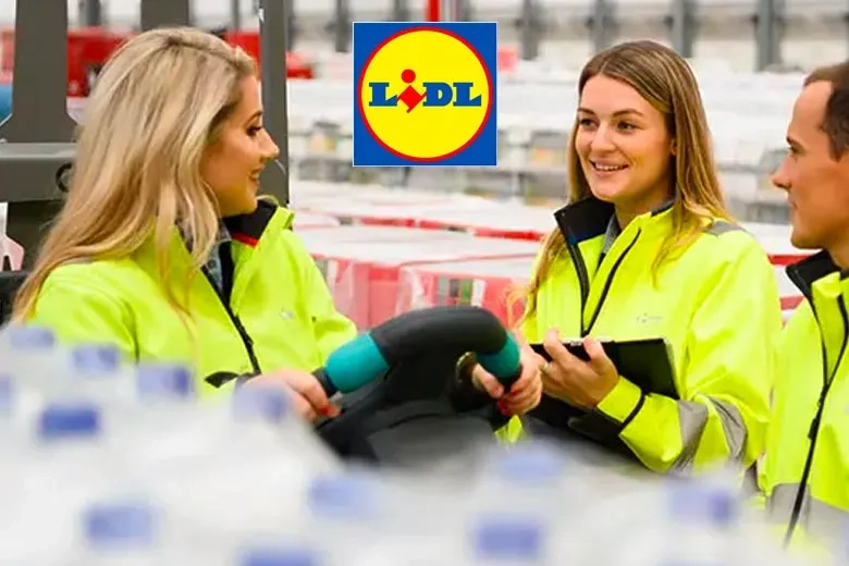 Three woman standing in high vis jackets