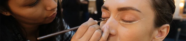 Make up artist working on a client