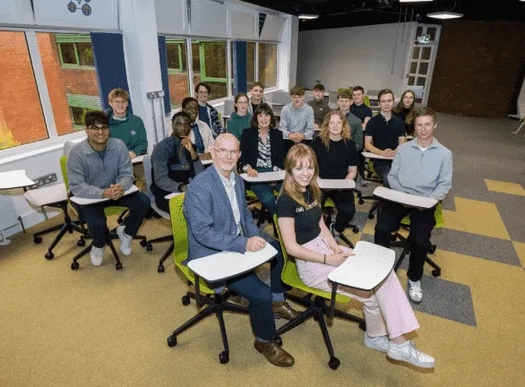 Group of people in a classroom setting