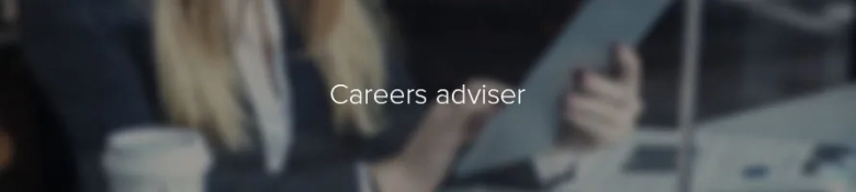 Blurred image of a person in a professional setting, possibly a careers adviser at work.